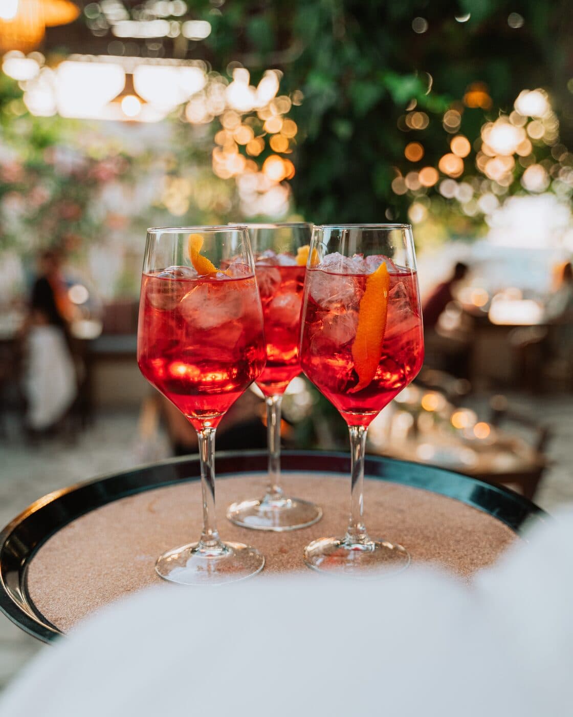 Spritz served on a tray in the courtyard