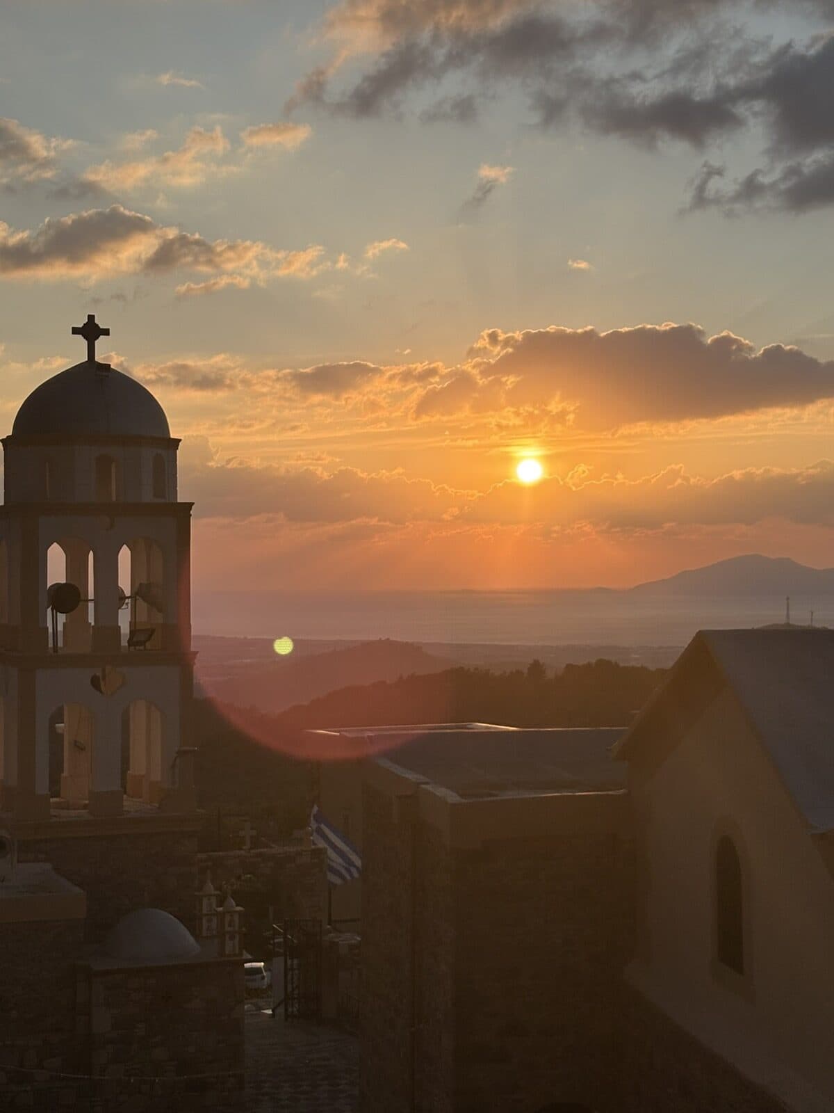 Sunset over the village church at Asomatos